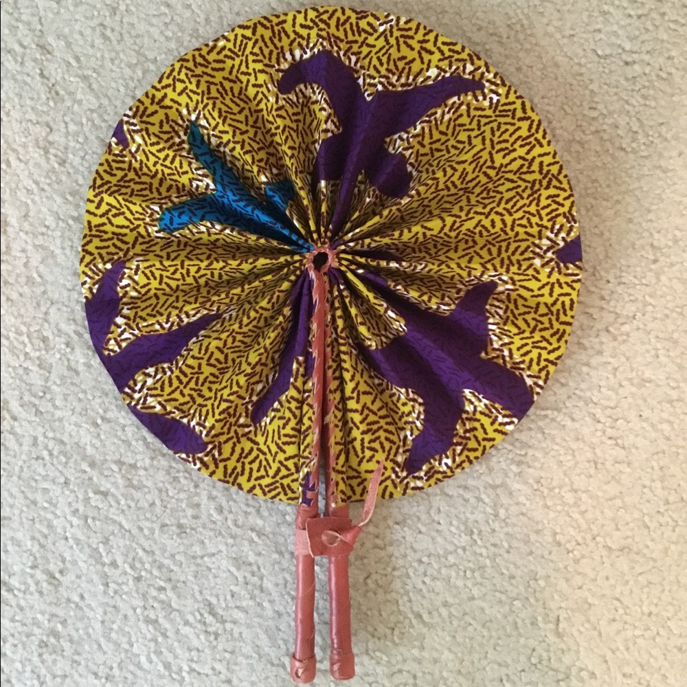 Beautiful leather and cloth fan.